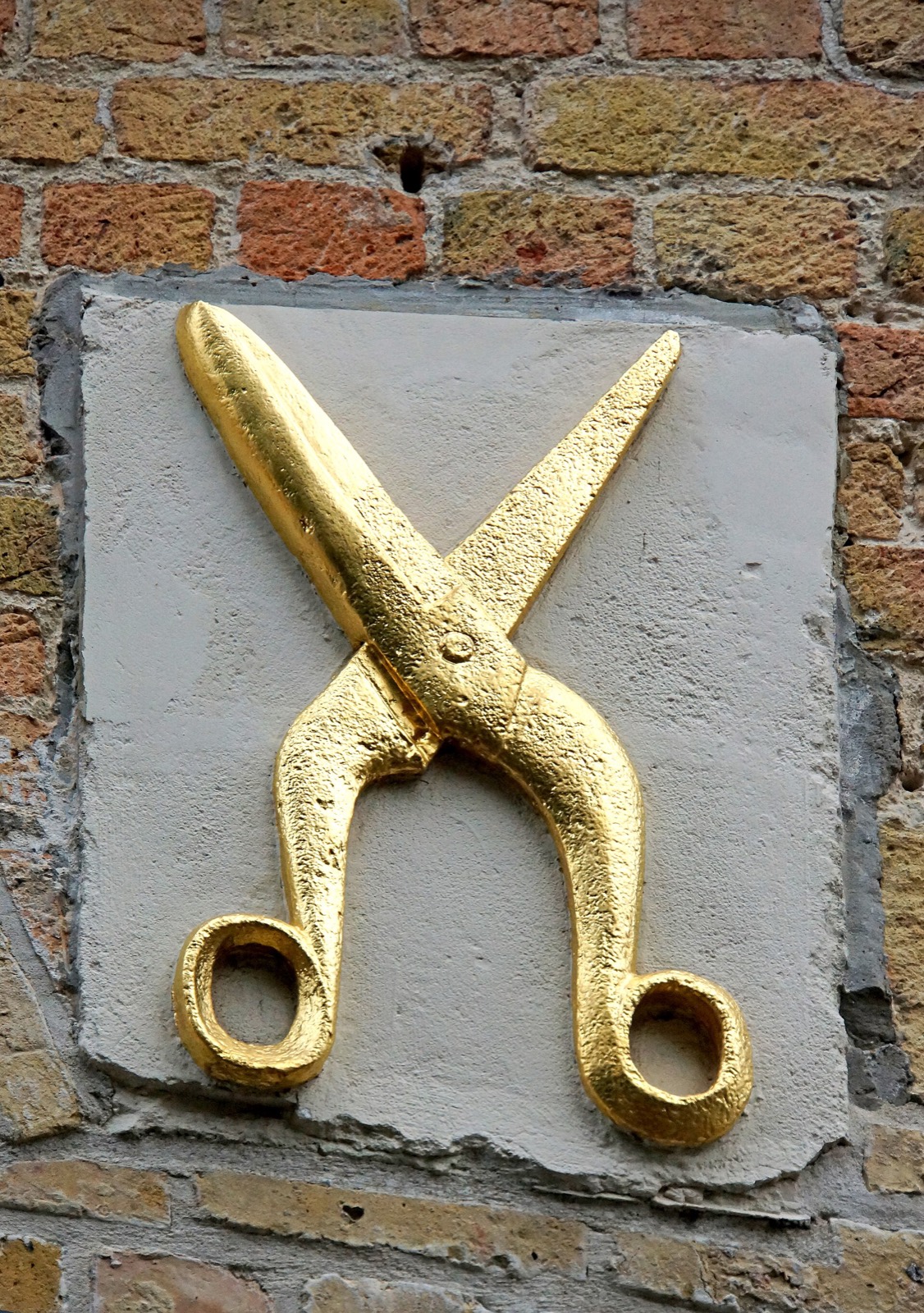 Borbélyolló motívum téglafalon, illusztráció
